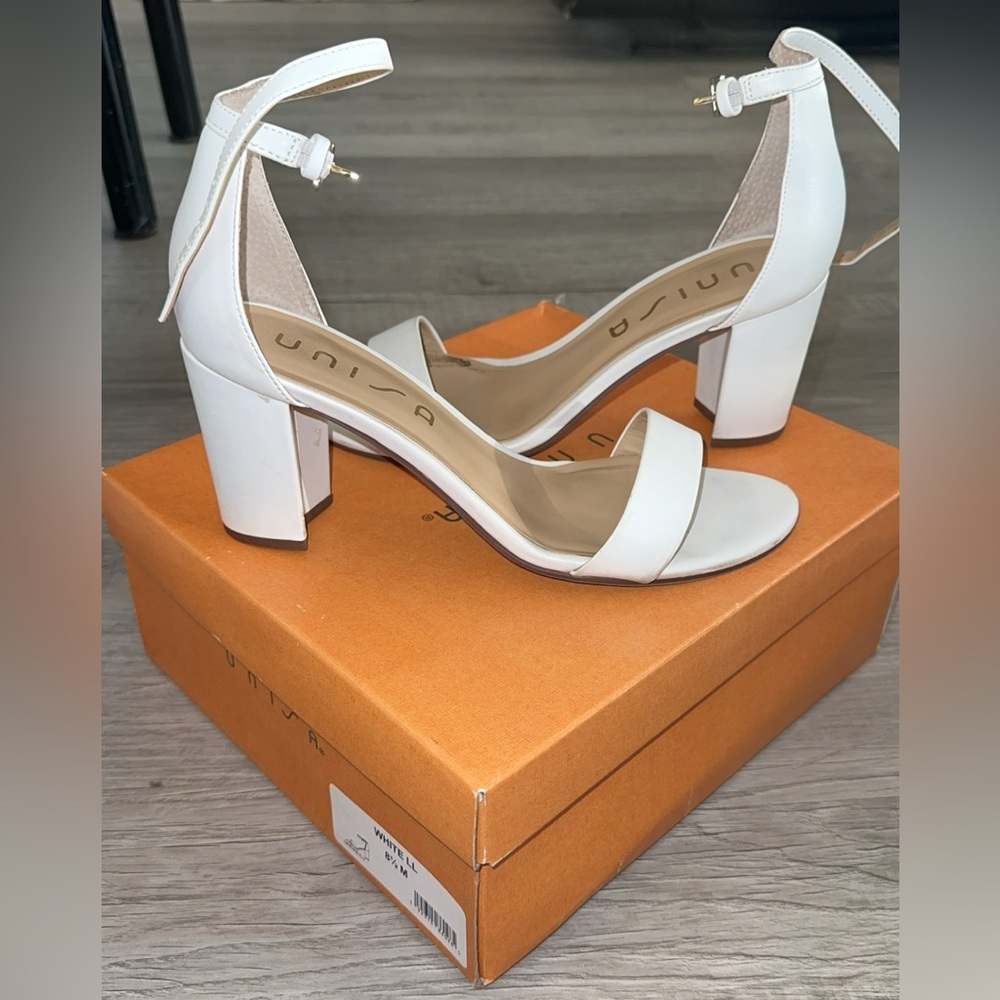 UNISA. White heeled sandals.